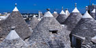 Discover whitewashed trulli in Puglia